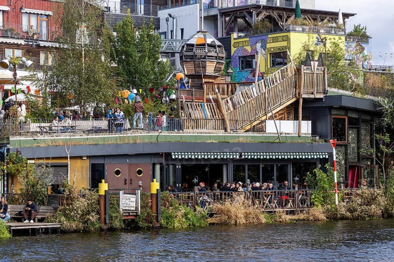 Holzmarkt 25, urban neighbourhood in Berlin-Friedrichshain. Internationally recognised example of user-driven urban development. Park with a popular view of the riverside, unconventional bars and food stalls. Cityscape Berlin, Germany, Europe