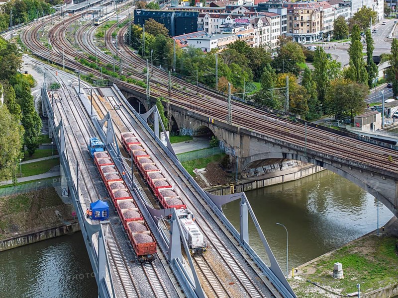 Load test on the Neckar Bridge, aerial view. Due to the unusual design, dimensional checks are mandatory in front of the bridge is opened to trains. Two goods trains with a combined weight of 960 tonnes load the 345-metre-long bridge over the Neckar. The bridge is part of the major Stuttgart 21 project. Stuttgart, Baden-Württemberg, Germany, Europe