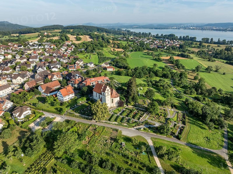 The church of St Johann and Vitus in Horn on the Höri peninsula, on the horizon the Hegau mountains and the town of Radolfzell on Lake Constance, aerial view, Gaienhofen, district of Constance, Baden-Württemberg, Germany, Europe