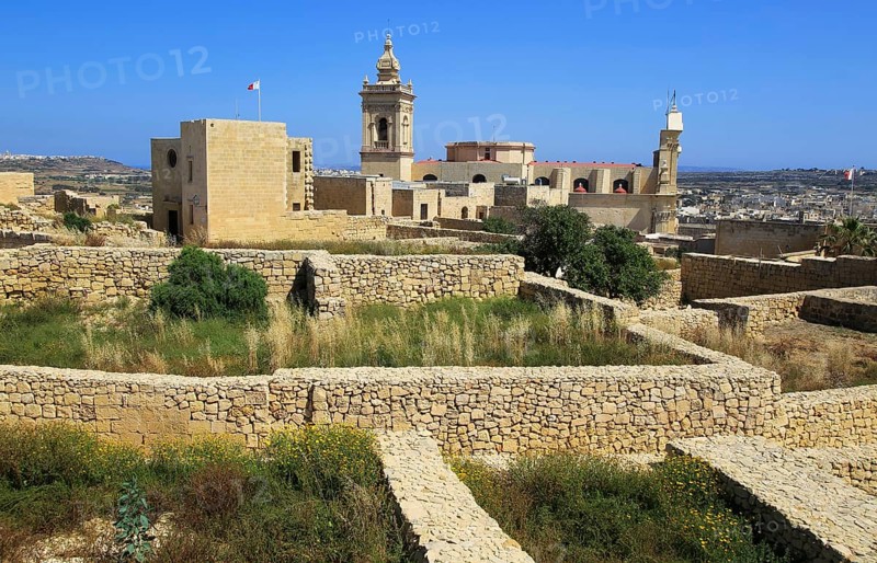 Cathedral church tower and ruins inside citadel castle walls Il-Kastell, Victoria Rabat, Gozo, Malta, Europe