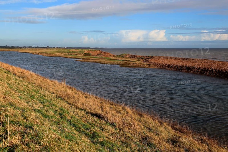 Rapid erosion of shingle bay bar landform on North Sea coast, Hollesley Bay, Bawdsey, Suffolk, England, UK