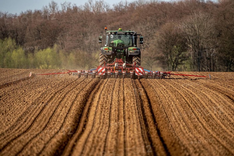 Sugar beet being sown in spring, precision sowing with precision seed drill, behind a tractor, Niederkrüchten, North Rhine-Westphalia, Germany, Europe