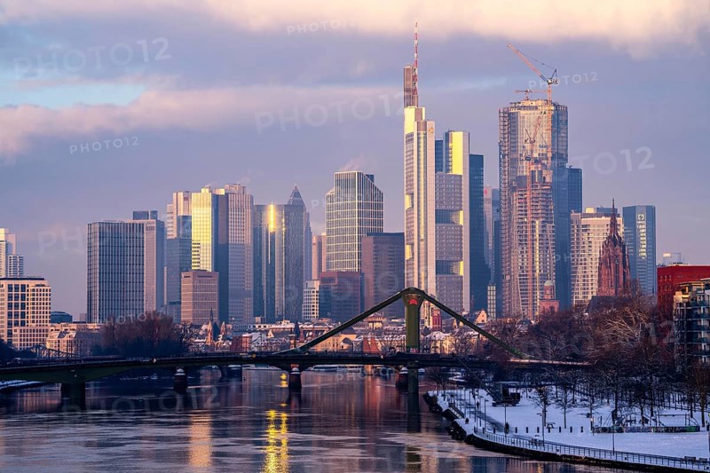 The skyline of Frankfurt am Main, skyscrapers of the banking district, Flößerbrücke, wintry morning, Hesse, Germany, Europe
