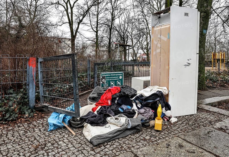 Clothing, a warning light and a refrigerator block the entrance to a public playground, illegal waste disposal in the Berlin district of Wedding, 15/02/2024