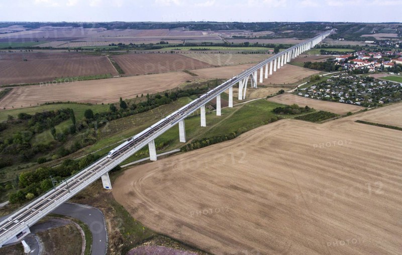 An aerial photo shows an ICE train travelling over the Unstruttal bridge near Karsdorf. The Unstruttal Bridge is a double-track railway bridge on the new Erfurt-Leipzig Halle line. With a length of 2668 metres, it is the second longest railway bridge in Germany, Karsdorf, 22.09.2016