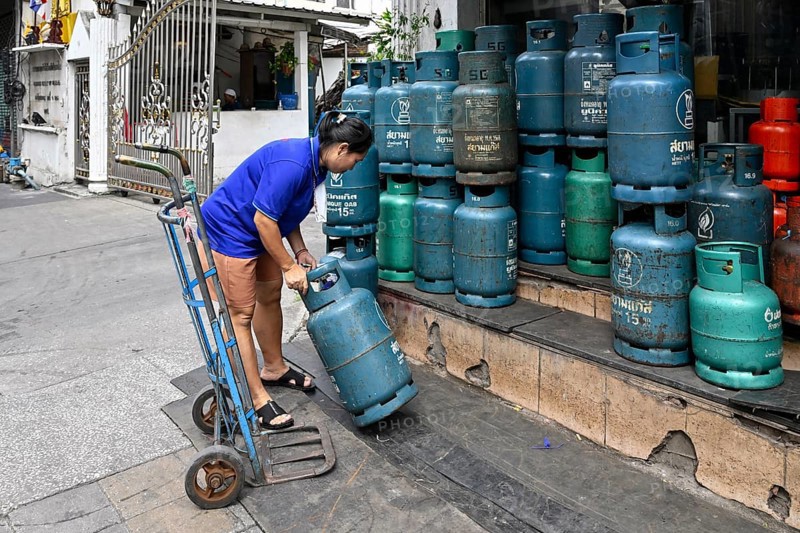 Gas cylinder woman with trolley