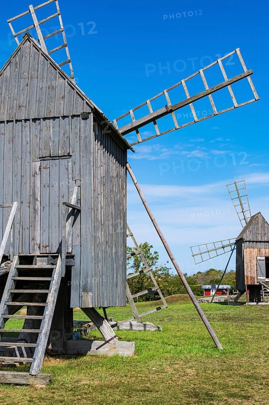 Three traditional historic windmills (Resmo väderkvarnar) in the village of Resmo on Öland, Kalmar län, Sweden, Scandinavia, Europe