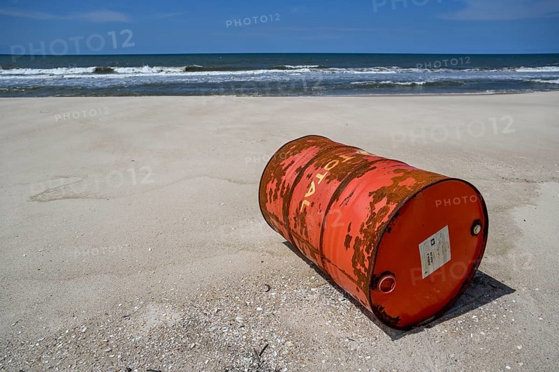 Washed up oil drum on the beach, Loango National Park, Parc National de Loango, Ogooué-Maritime Province, Gabon, Africa