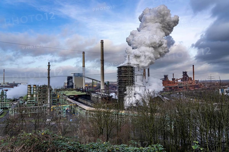 The Thyssenkrupp Steel steelworks in Duisburg-Marxloh, on the Rhine, quenching tower of the coking plant, blast furnaces 1 and 2, right, North Rhine-Westphalia, Germany, Europe
