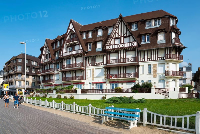 Large half-timbered house with well-kept garden on a promenade with blue bench, Trouville-sur-Mer, Trouville, Cœur Côte Fleurie, Honfleur-Deauville, Lisieux, Calvados, Normandy, English Channel, France, Europe