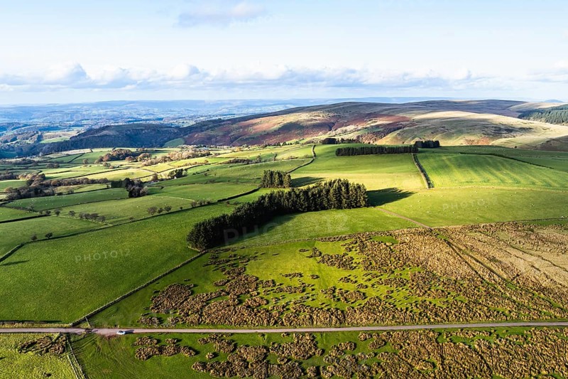 Farms over Black Mountain from a drone, Brecon Beacons National Park, Carmarthenshire, Wales, England, United Kingdom, Europe