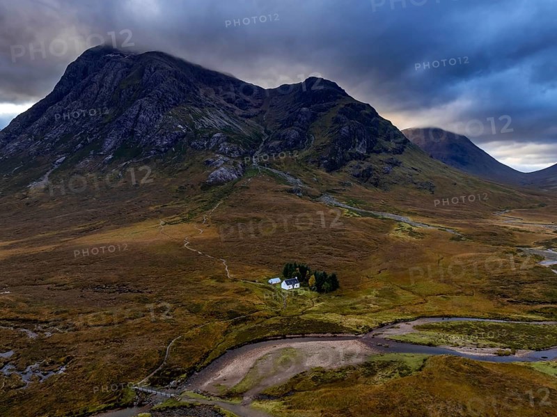 Cloudy mood, river, moor, aerial view, mountain landscape, autumn, cottage, view of Langangarbh Cottage and Buachaille Etive Mòr, Glencoe, Scottish Highlands, Scotland, Great Britain