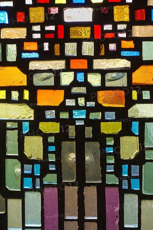Glass blocks, coloured glass, cemetery near the parish church of St. Mauritius, Langenenslingen, Upper Swabia, Baden-Württemberg, Germany, Europe