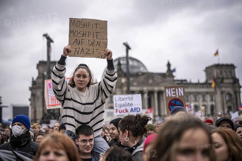 150, 000 people gather around the Bundestag in Berlin to build a human wall against the shift to the right in society. We are the firewall chanted demonstrators from a wide range of social groups. Recordings on 03.02.2024 in Berlin