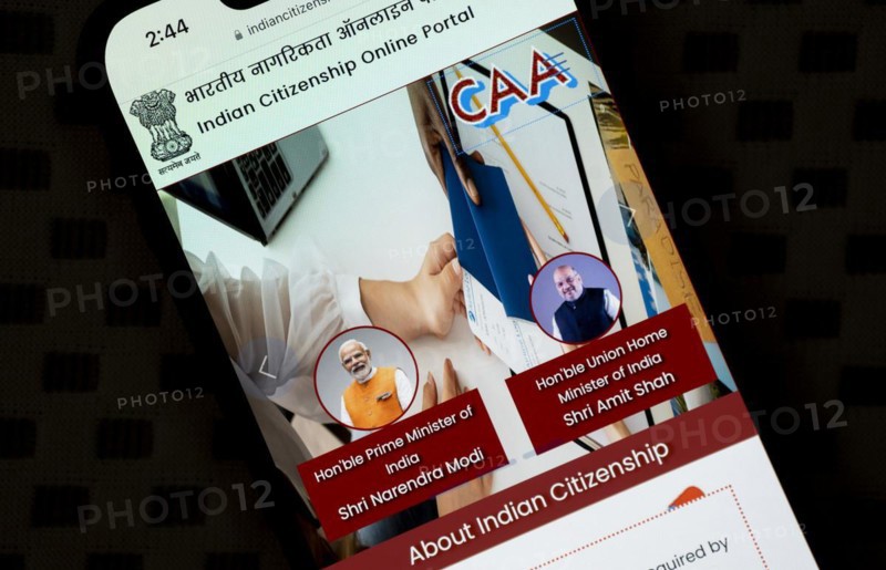 In this photo illustration, a portal to apply for Indian citizenship under the Citizenship (Amendment) Act, 2019, displayed a smartphone on March 12, 2024 in Guwahati, India. The Citizenship Amendment Act (CAA), passed by the Indian Parliament in 2019, indeed grants expedited citizenship to specific religious minorities from Afghanistan, Bangladesh, and Pakistan who arrived in India on or before December 31, 2014. These religious minorities include Hindus, Sikhs, Buddhists, Jains, Parsis, and Christians, Asia