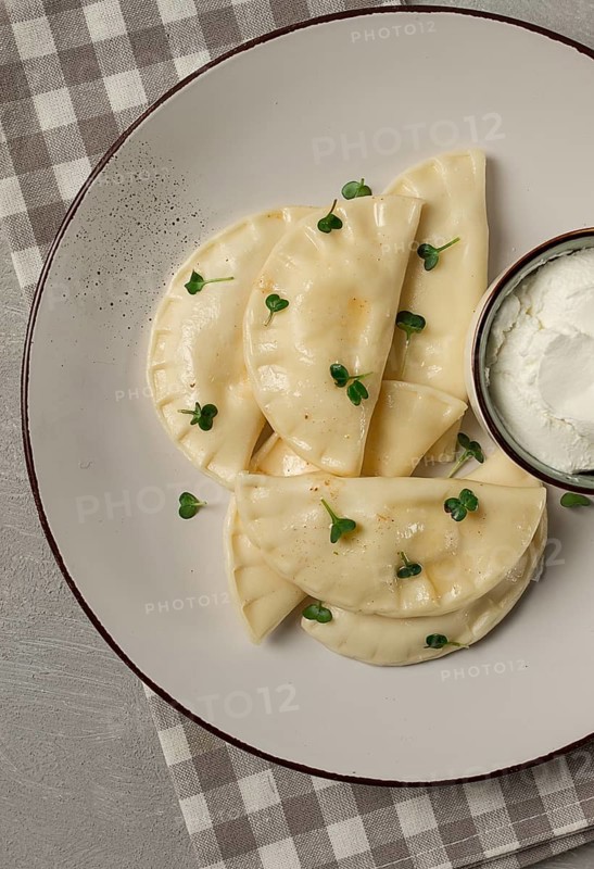 Pierogi, a traditional dish of Polish cuisine, dumplings, top view, close-up, no people