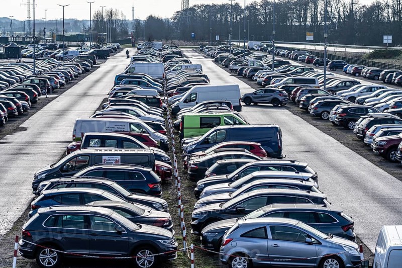 Large car park at the ferry terminal to the East Frisian islands of Norderney and Juist, Lower Saxony, Germany, Europe