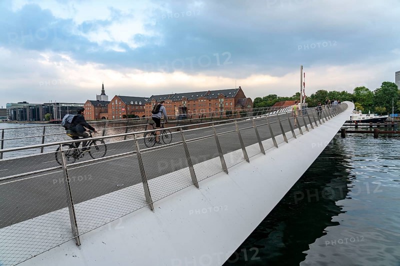 Cyclists on the Lille Langebro cycle and pedestrian bridge over the harbour, Copenhagen is considered the cycling capital of the world, 45% of the population travel by bike, Denmark, Europe