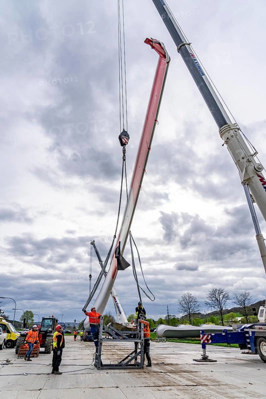 Preparation for the transport of a 68 metre long blade, a wind turbine, with a self-propelled Blade-Lifter vehicle, over a 40 km long route in the Bergisches Land, through towns, villages, over country roads, narrow through roads, to the construction site of the wind turbine near Hagen, North Rhine-Westphalia, Germany, Europe