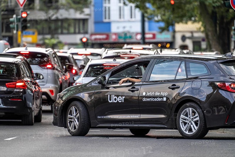 Rental car, taxi, provided to passengers via an app by the online hire service Uber, in Düsseldorf, North Rhine-Westphalia, Germany, Europe