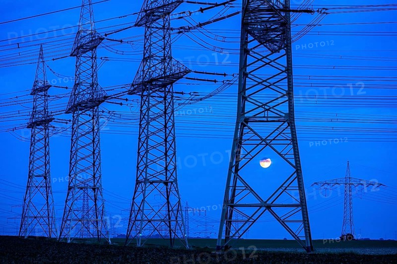 Part of a line route, 380 KV extra-high-voltage line, district town of Bergheim, Rhein-Kreis-Neuss, Amprion substation, full moon, North Rhine-Westphalia, Germany, Europe