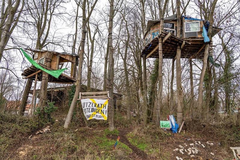 Camp of climate activists in the rest of the village of Lützerath, the last place to be excavated at the Garzweiler 2 open-cast lignite mine, North Rhine-Westphalia, Germany, Europe