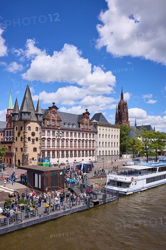Saalhof with rent tower and excursion boats at the Mainkai under a blue sky with cumulus clouds in Frankfurt am Main, Hesse, Germany, Europe