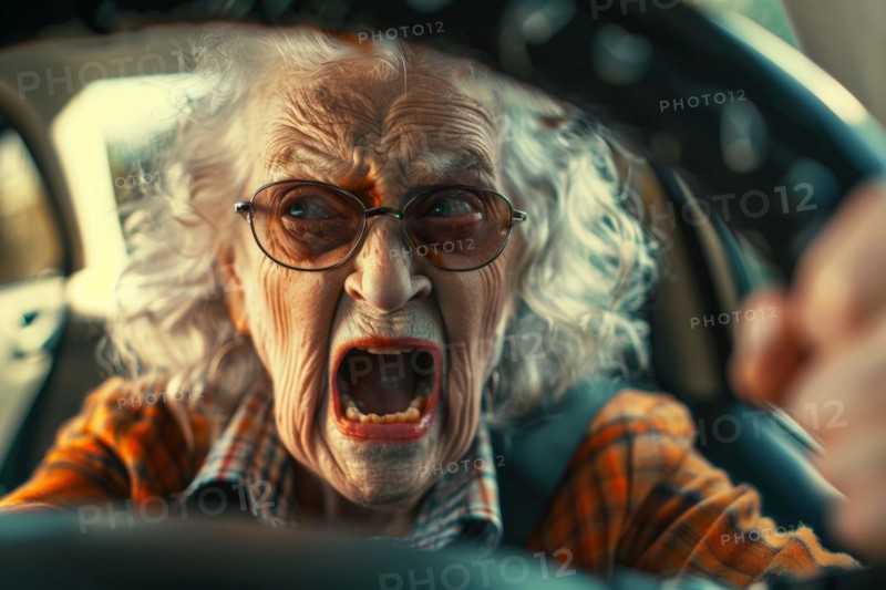Elderly woman sitting behind the steering wheel screaming in exasperation, symbolic image for aggressive behaviour in road traffic, AI generated, AI generated, AI generated