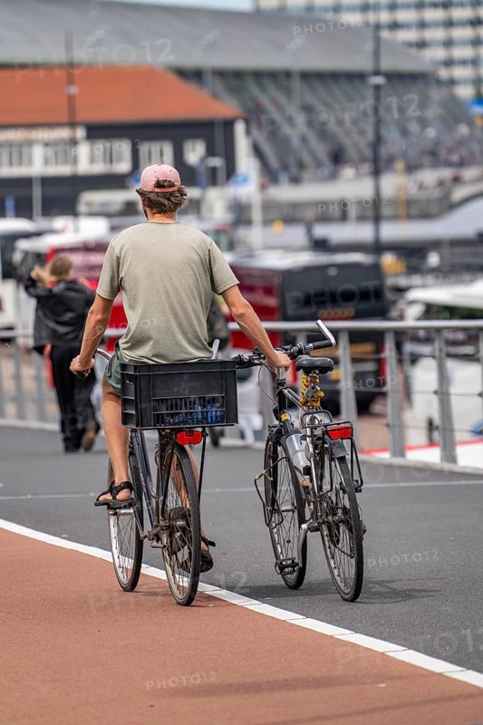 Cycle path in Amsterdam, two-wheel transport next to the bicycle, Netherlands