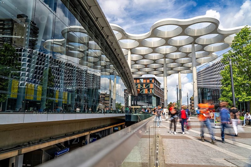 Station forecourt of Utrecht Centraal station, people on their way to, from the station, Netherlands