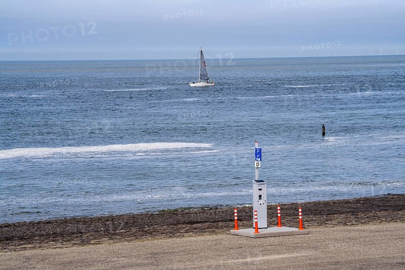 Westkapelse Zeedijk, North Sea dyke in Zeeland, can be used as a car park, parking ticket machine, near Westkapelle, Netherlands