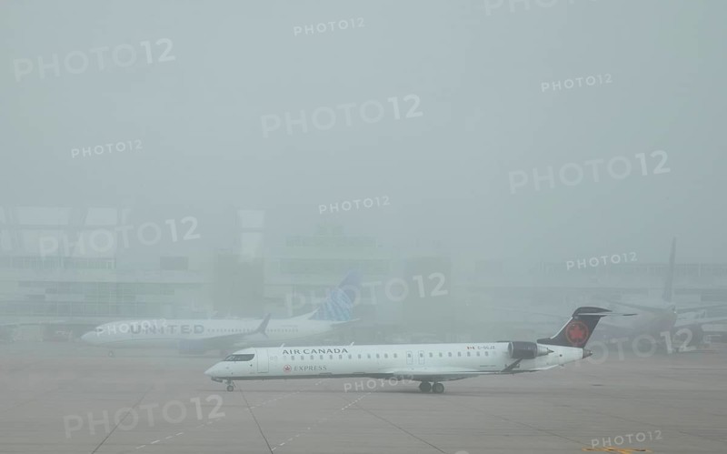 Denver, Colorado, Airliners on the ground in foggy weather at Denver International Airport (DEN)