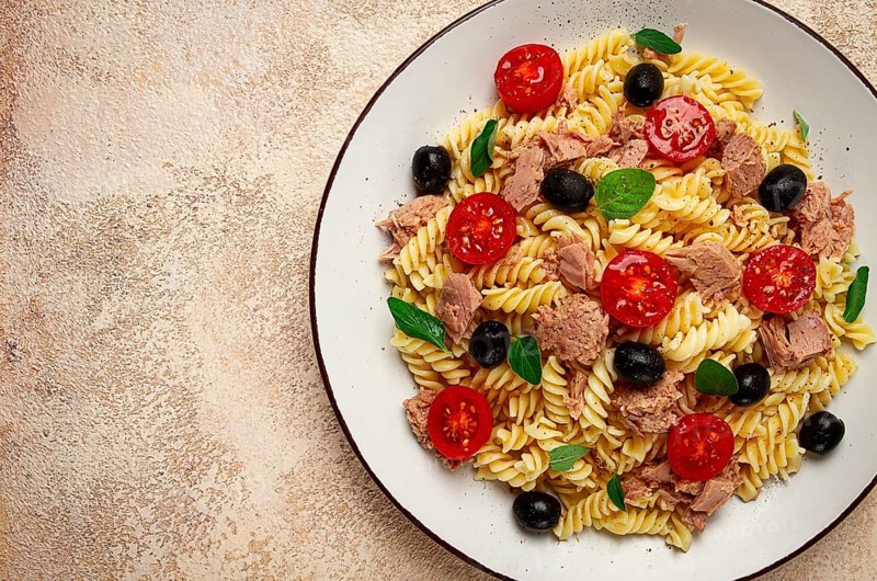 Tuna salad, fusilli pasta, olives and cherry, olive oil, homemade