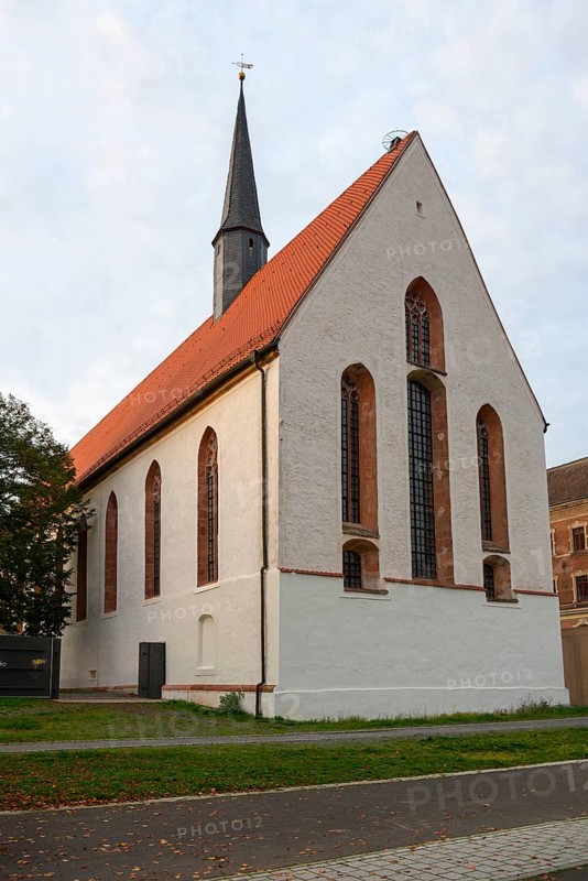 Gothic church with red tiled roof and high tower under a cloudy sky, St Augustin's Monastery Church, Grimma, Leipzig, Saxony, Germany, Europe
