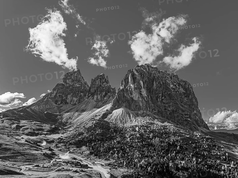 The peaks of the Sassolungo group, Passo Sella, drone shot, black and white photo, Val Gardena, Dolomites, Autonomous Province of Bolzano, South Tyrol, Italy, Europe