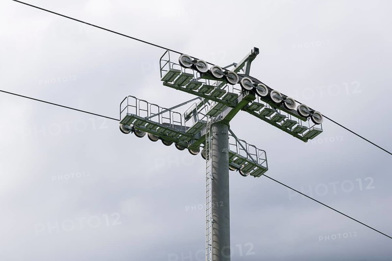 A cable car support with steel cables in a cloudy sky, Jennerbahn am Königsee, Königsee, Berchtesgadener Land, Upper Bavaria, Bavaria, Germany, Europe