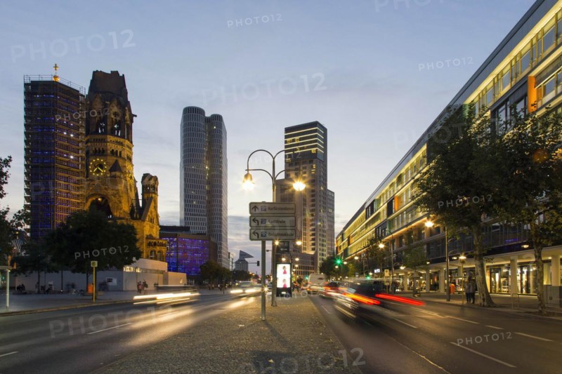 Evening atmosphere in Berlin's City West with the Bikini Sopping mall, right, the Memorial Church, the Waldorf Astoria Hotel and the Upper West skyscraper, 25/09/2016