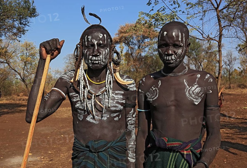 South Ethiopia, in Maco National Park, Mursi tribe, two Mursi boys with painted faces, Ethiopia, Africa