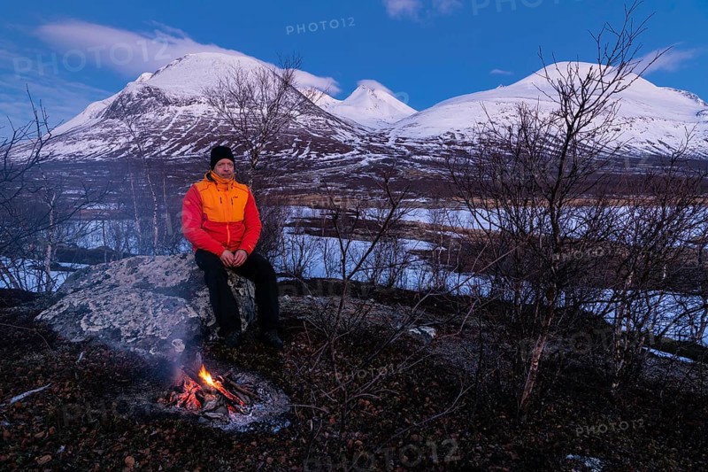 Man at the campfire, Stora Sjöfallet National Park, World Heritage Laponia, Norrbotten, Lapland, Sweden, Lapland, Sweden, Europe