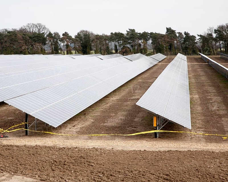 Solar array of photovoltaic panels in a large new solar park at Bucklesham, Suffolk, England, United Kingdom, Europe