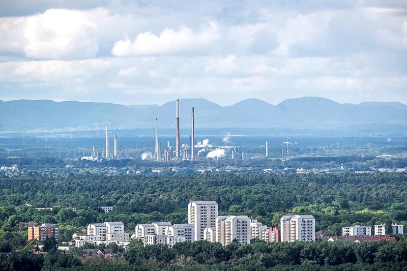 View from the Turmberg over Karlsruhe, in the background the Upper Rhine mineral oil refinery, in the foreground the Rintheimer Feld neighbourhood, Karlsruhe, Baden-Württemberg, Germany, Europe