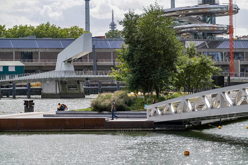 First part of the floating park, in the Rijnhaven, 28ha harbour basin, has now been filled in to just under a third to create space for up to 3000 flats, there will be an artificial beach, a floating park connected by jetties, restaurants and shops, cultural facilities, a major urban development project in the old harbour, the Rijnhaven borders on the popular Kop van Zuid and Katendrecht districts, Rotterdam, Netherlands