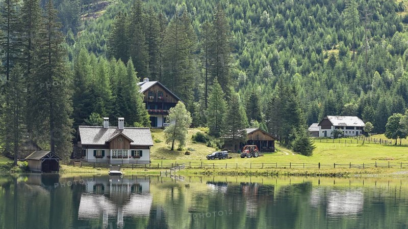 The Schwarzenseealm on Lake Schwarzensee, summer residence of the noble Colloredo-Mannsfeld family, in Obertal, Niedere Tauern, Kleinsölktal, Styria, Austria, Europe