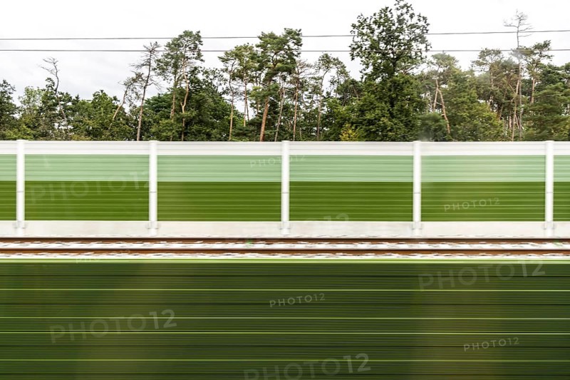 Noise barrier as a contrast to the forest, Nuremberg-Bamberg railway line near Strullendorf, Upper Franconia, Bavaria, Germany, Europe