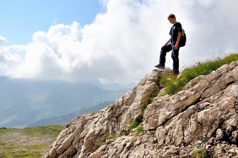 Ten-year-old boy hiking, Nebelhorn, Allgäu Alps, Bavaria, Germany, Europe