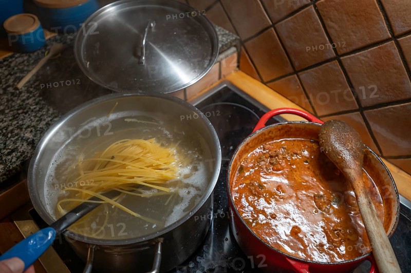 Spaghetti bolognese is prepared on the cooker, Mecklenburg-Vorpommern, Germany, Europe
