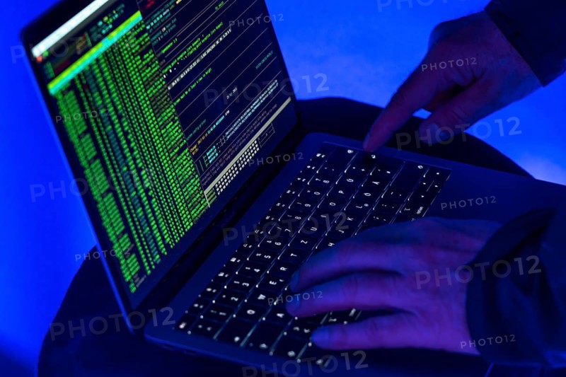Symbolic image cyber attack, computer crime, cybercrime, computer hackers attack a network, computer, IT infrastructure