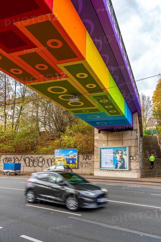 The Rainbow Bridge or Lego Bridge 2.0, over Dahler Straße, B7, undersides of bridges designed by artists, part of the Nordbahntrasse, a former railway line, now a cycle and footpath, Langerfeld district, Wuppertal, North Rhine-Westphalia, Germany, Europe