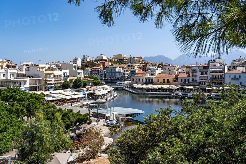 The village of Agios Nikolaos, in the eastern part of Crete, view over Lake Voulismeni, connected to the sea, old town, Greece, Europe