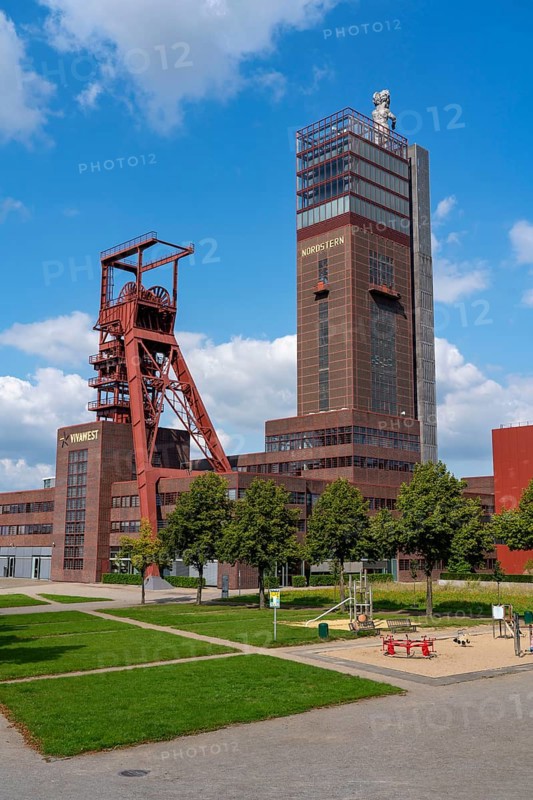 Nordsternpark, former site of Nordstern colliery, pithead tower, Nordstern tower, Hercules sculpture, headquarters of housing provider Vivawest in Gelsenkirchen, North Rhine-Westphalia, Germany, Europe